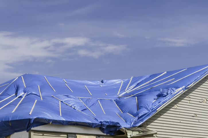 Roof Tarping by Custom Roofing Solutions LLC